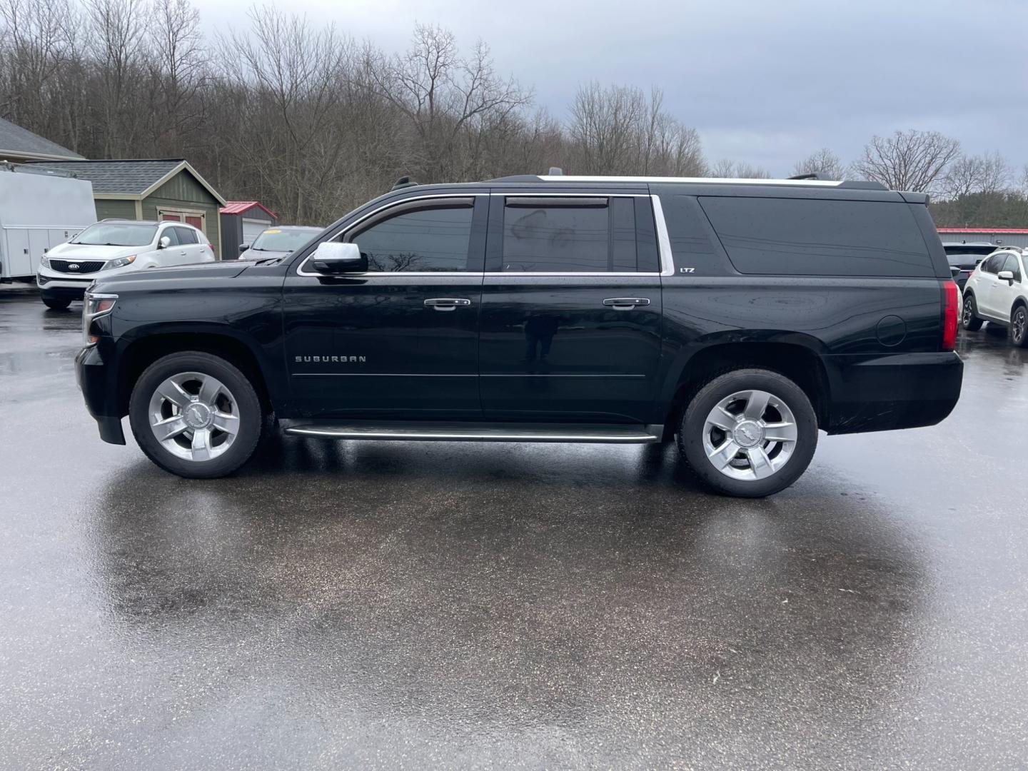 2016 Black /Brown Chevrolet Suburban LTZ 4WD (1GNSKJKC3GR) with an 5.3L V8 OHV 16V engine, 6A transmission, located at 11115 Chardon Rd. , Chardon, OH, 44024, (440) 214-9705, 41.580246, -81.241943 - Photo#14